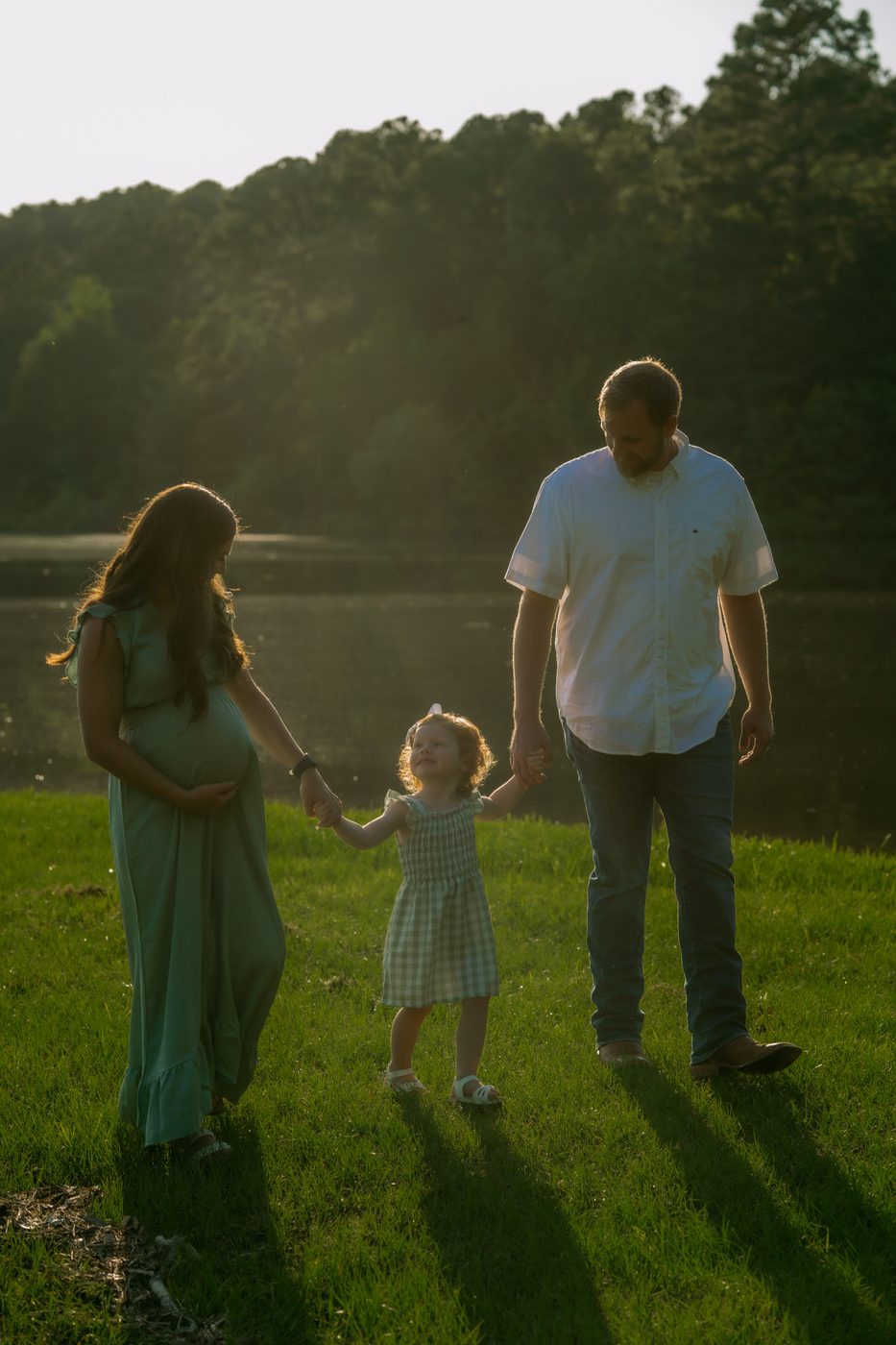 Candid family session at golden hour by DeGray Lake in Central Arkansas
