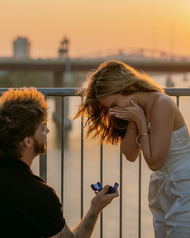 Emotional surprise proposal moment at sunset in Central Arkansas